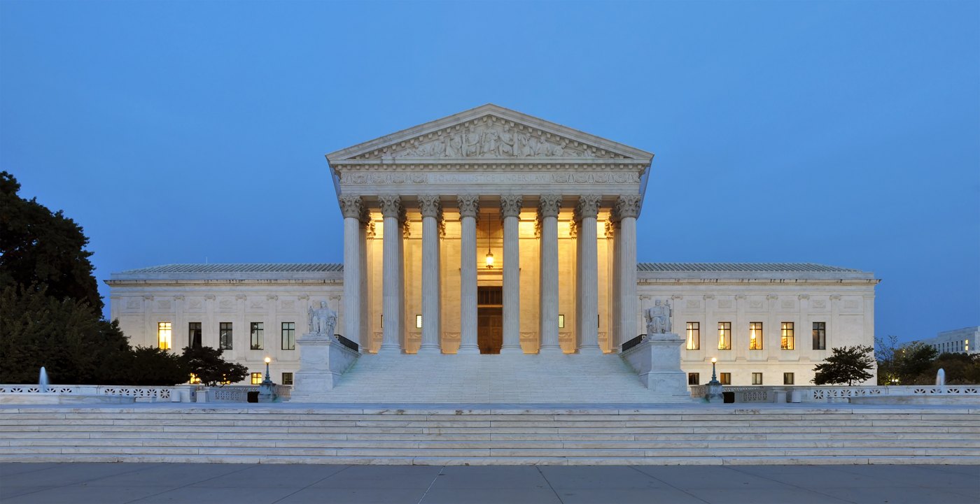 The U.S. Supreme Court building at dusk, October 2011; contextual panorama.